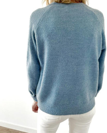 Himmelblauer Pullover Mit V-ausschnitt Und Knopfleiste